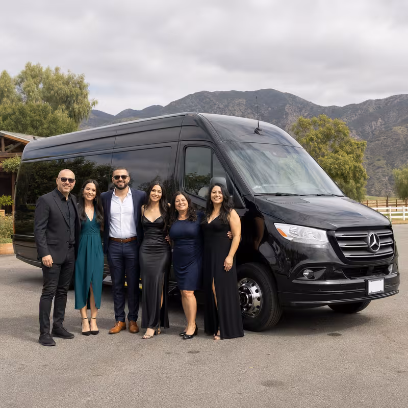 Group beside a Mercedes Sprinter limo from the Fontana fleet