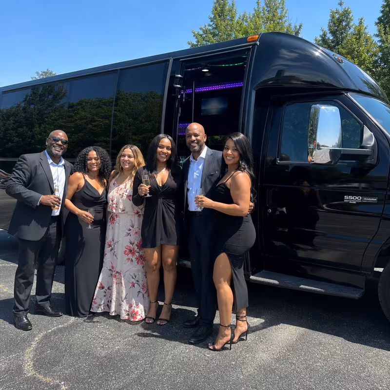 Passengers loading luggage while boarding an Fontana group shuttle