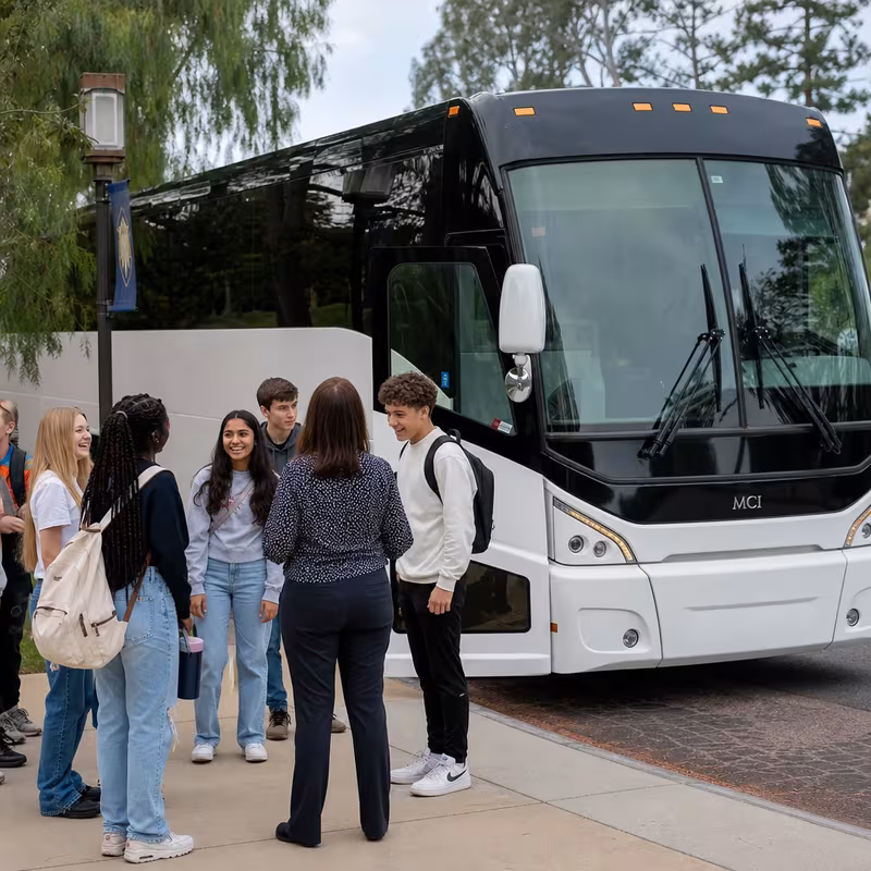 Black Mercedes Sprinter van staged for an Fontana School Transportation group